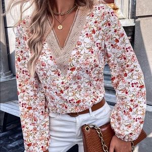 🌿 BOHO ORANGE MULTI FLORAL VNECK BLOUSE!